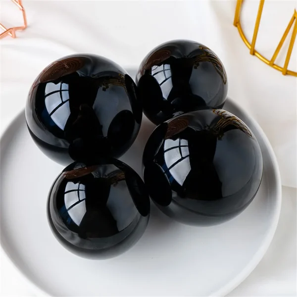 Unveil Deep Wisdom: Natural Black Obsidian Crystal Sphere for Protection & Power - Image 4