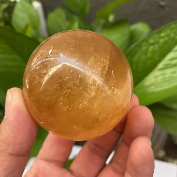Radiate Joy & Abundance: Natural Citrine Calcite Quartz Crystal Sphere with Wood Bracket - Image 3